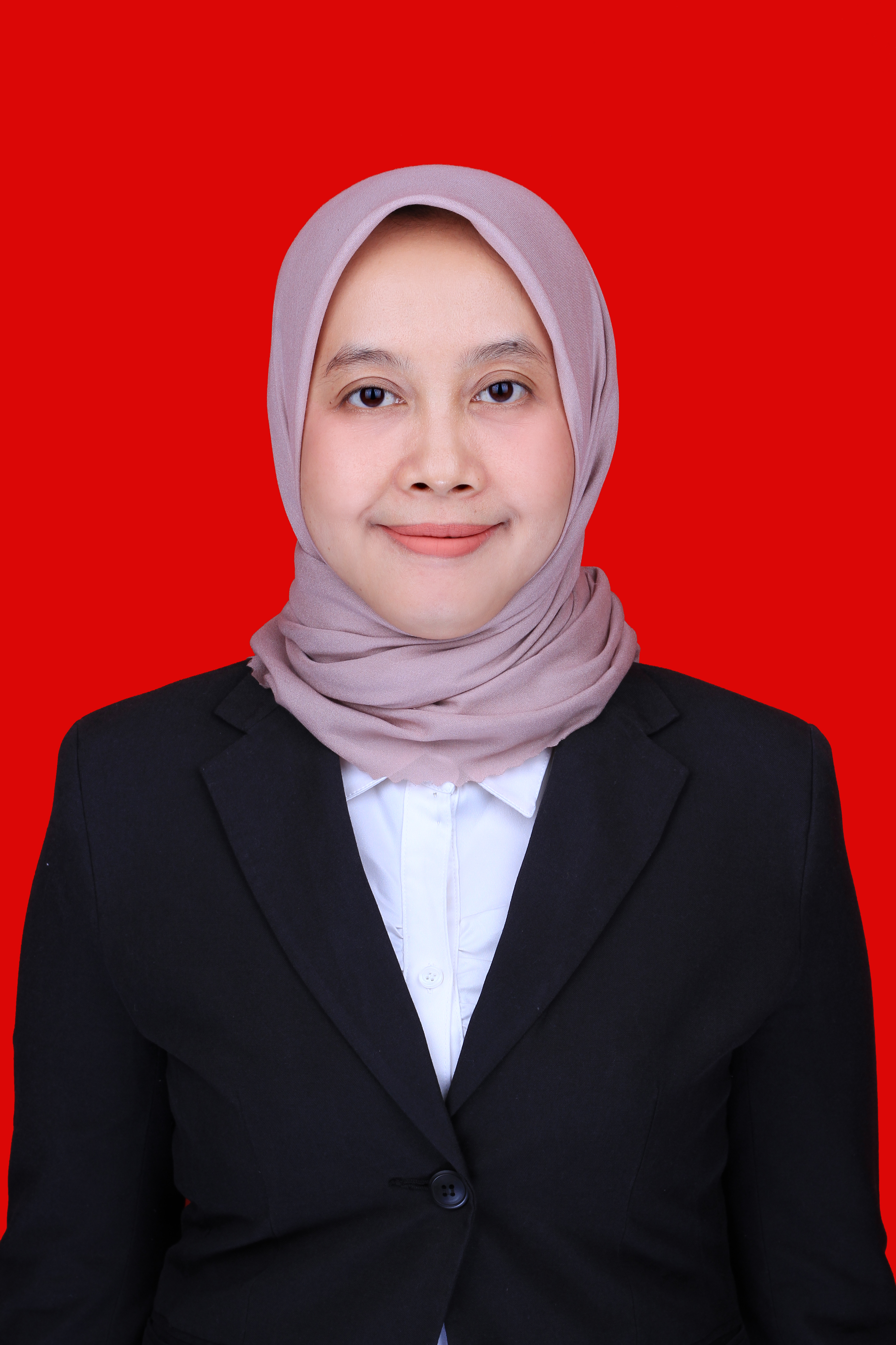 Foto Lusiani Dewi Assaat,  S.Pd., M.Si. 
